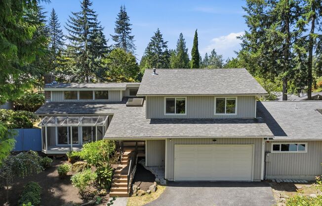 Spacious Tri-Level Home in West Lake Sammamish with Luxurious Features and Prime Location