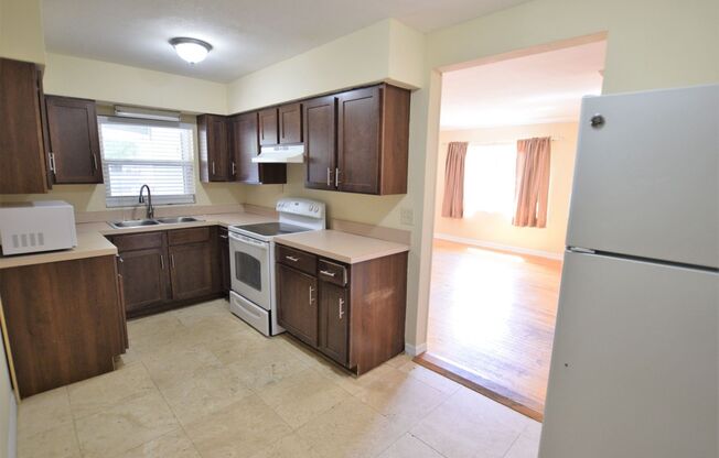 Charming 3-Bedroom Home with Huge Fenced Yard Near Downtown & Hourglass District!
