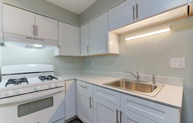 Stainless Steel Sink With Faucet at Johnson Legacy Apartments, Milwaukee, 53223