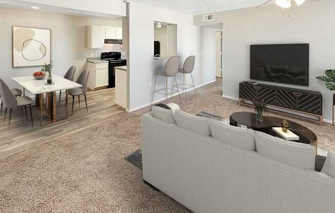 A living room with a grey couch and a television.