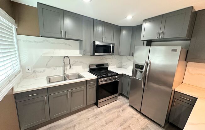 Completely Renovated 2 Bed + 2 Bath House w/Parking! Close to USC, Freeways, and DTLA