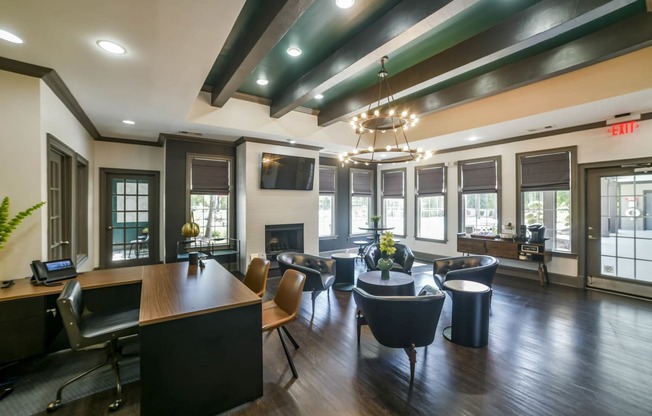 a conference room with a table and chairs and a fireplace