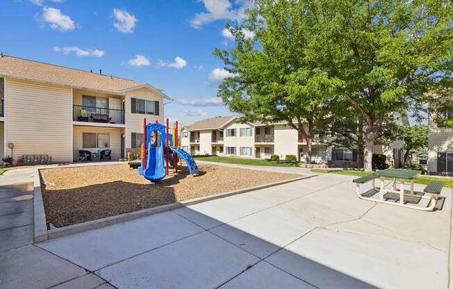 the preserve at ballantyne commons playground with a blue slide