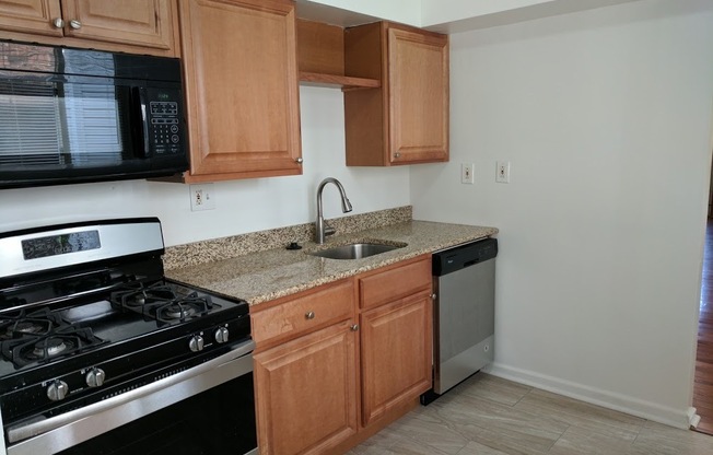Check out this Totally Updated First Floor Duplex! 2BR+Den