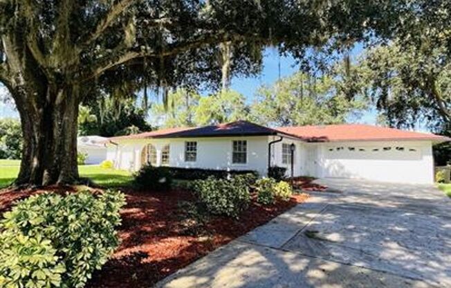 Eustis Lake Front Home with 2 Primary Bedrooms!