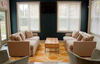 Living room with two couches at Emory Woods Apartments, Durham, NC, 28205..