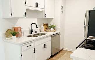 kitchen with white cabinets  at Mission Valley, San Diego, California