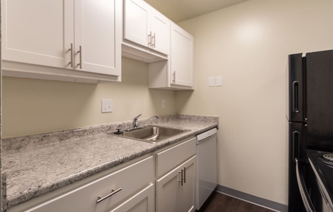 This is a photo of the kitchen in a 849 square foot split 2 bedroom, 2 bath apartment at Park Lane Apartments in Cincinnati, OH.