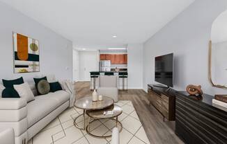 a living room with a couch and a table