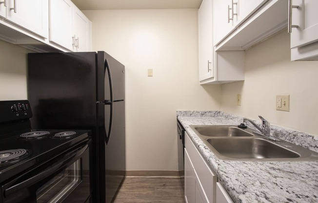 This is a photo of the kitchenin a 849 square foot 2 bedroom, 2 bath apartment at Park Lane Apartments in Cincinnati, OH.