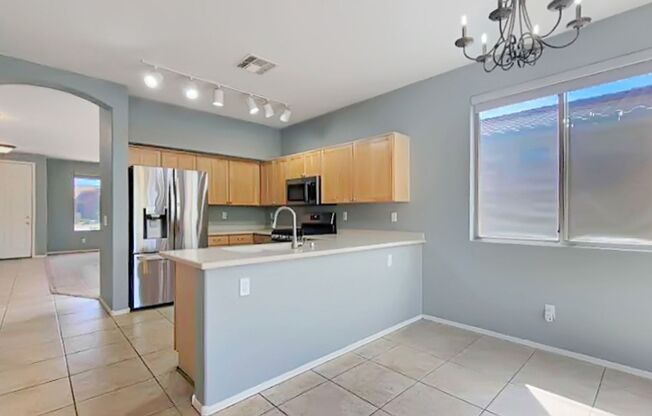 SOLAR & NEW CARPET makes this home a BARGAIN!  Estrella Mtn Ranch amenities!