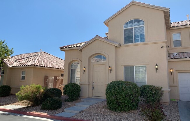Two story home in gated community with community pool, featuring 4 bedrooms including one bedroom downstairs with a private bathroom! Home has a large great room with high ceilings that's visible from the second floor! Open kitchen with granite countertop