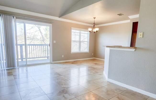 Living room with travertine in Briarwood floor plan