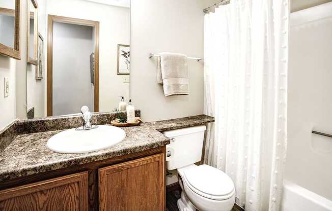 One- two- and three-bedroom apartment homes featuring amenities like three pools, fitness center, basketball court and much more at The Pointe in La Vista, NE