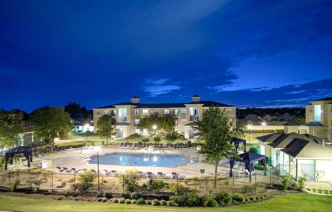 Sparkling pool at night at Sonoma Grande Apartments in South Tulsa, OK 1, 2 & 3 Bedrooms.