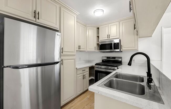 Renovated Townhome Apartments in Prime Virgil Village Location; SPECIAL - FREE RENT