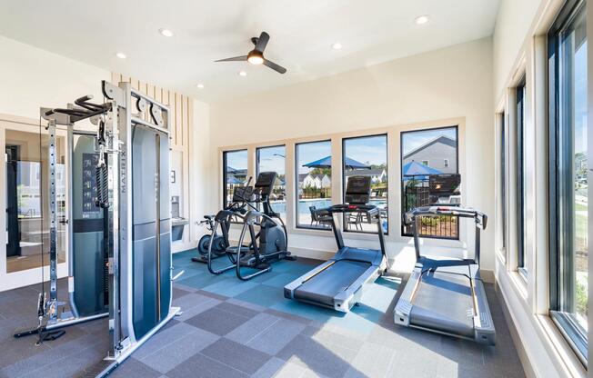 Club-quality fitness studio with cardio equipment. This image is a representation of the fitness studio at Amavi Brier Creek and is tentatively scheduled to open Summer 2025.