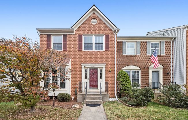 Modern Brick End-Unit Townhome with Stunning Upgrades and Serene Wooded Views