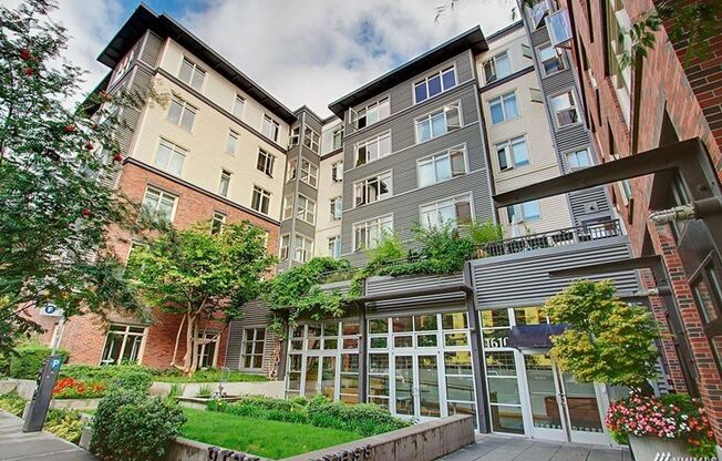Top floor unit in highly desirable Press condominium building.  1 bed 1 bath with parking.