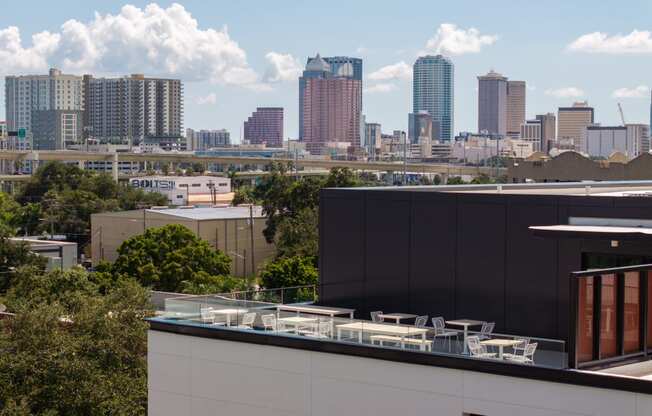 a view of the city skyline from the roof of a building