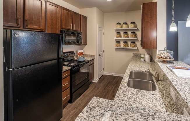 Granite Counter Tops In Kitchen at Abberly CenterPointe Apartment Homes by HHHunt, Midlothian, VA, 23114