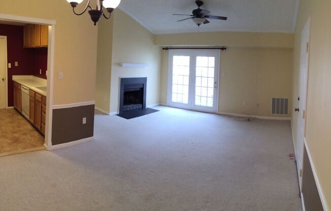 Top Floor Condo with Fireplace and Open Floorplan! Assigned Parking!