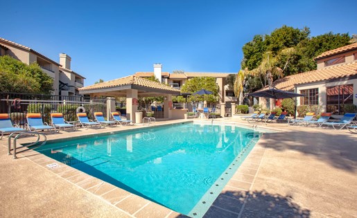 Swimming pool and lounge chairs