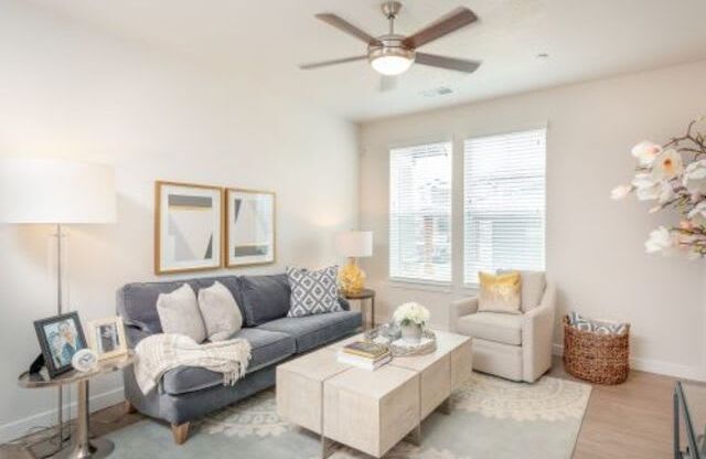 Large Living Area with Ceiling Fan at Parc on 5th Apartments and Townhomes
