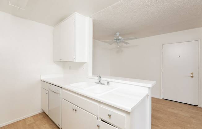 Kitchen with White Appliances and White Cabinets