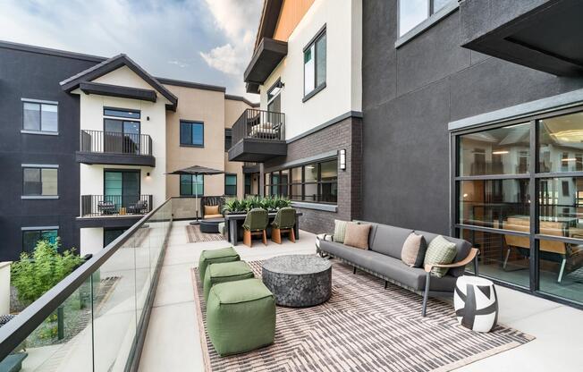 Sky lounge seating offers a stylish outdoor gathering space with elevated views, contemporary furnishings, and ample room to relax or connect with neighbors.
