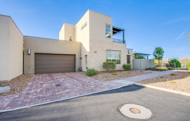 Absolutely gorgeous 2 bedroom 3.5 bathroom townhome with den in prestigious 55+ Trilogy community in Summerlin!