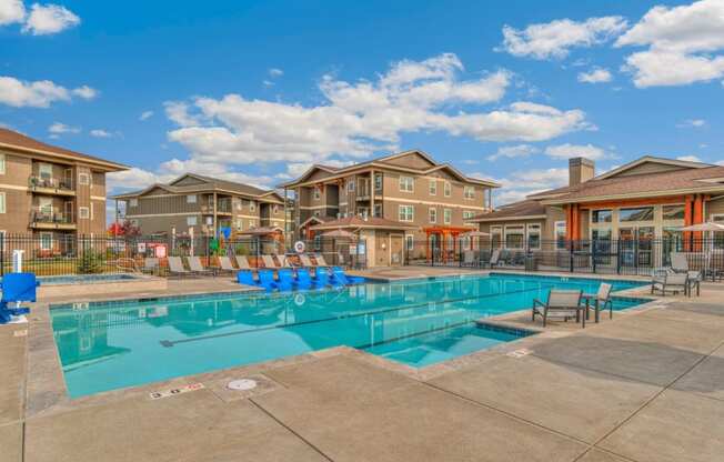 RedPoint Apartments Pool with Lounge Chairs