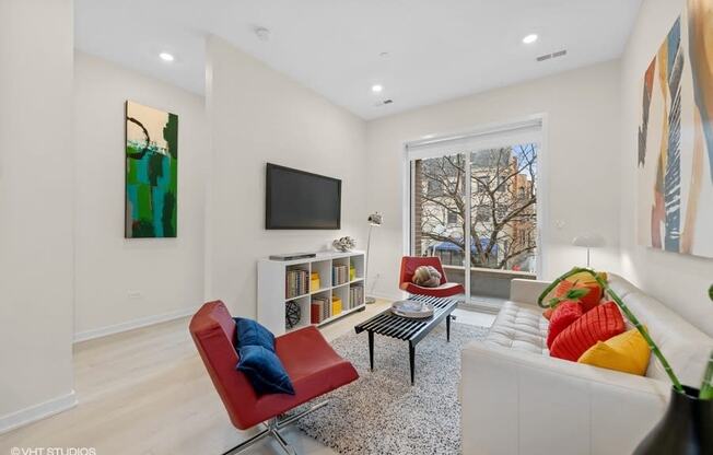 a living room with a couch and a tv