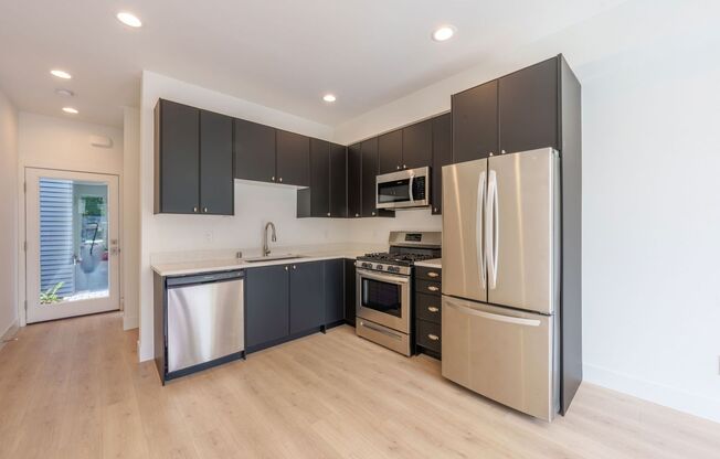 New Construction 2 Bedroom 2 Bath Townhome with 360' Rooftop view