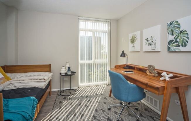 Bedroom with upgraded wood plank flooring