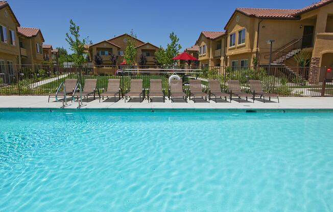 Relax by the pool in Villa Siena Apartments