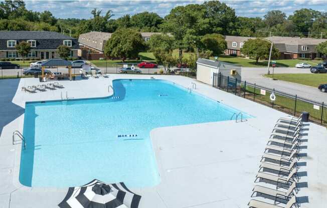 large pool with seating nearby at Cameron, North Carolina, 27893