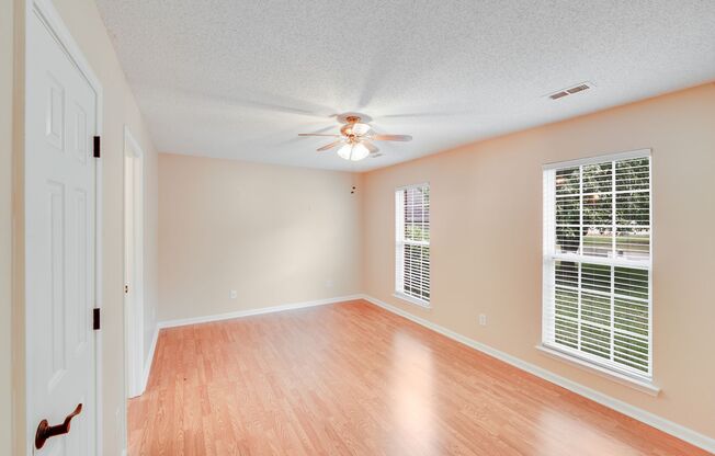 Comfort Meets Function in This 3BR/2BA Cedar Lane Farms Ranch with Backyard Retreat