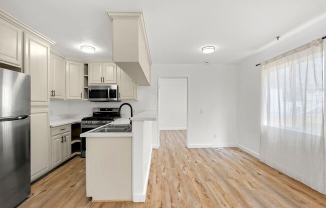 Renovated Townhome Apartments in Prime Virgil Village Location; SPECIAL - FREE RENT
