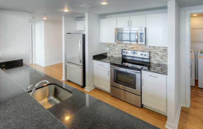 Kitchen with Stainless Steel Appliances and Granite Countertops
