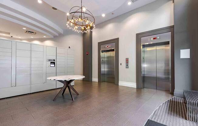 A modern dining area with a table and chairs.