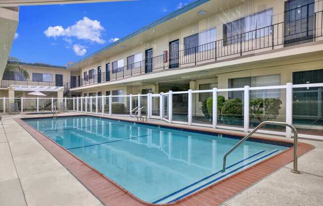 the swimming pool at our hotel in a city at Olive Tree Apartments, California, 90503