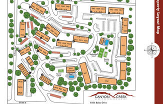 a site plan of a parking lot with buildings and trees