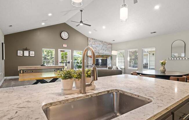 Clubhouse kitchen with a stainless steel sink at Clackamas Trails Apartments, Oregon, 97222