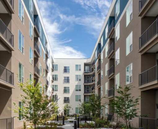 Courtyard with benches ground level at SevenO2 Main Apartments, Salt Lake City, UT