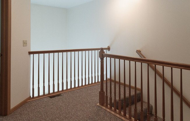 Our two-story floor plans feature a balcony that overlooks the living room.