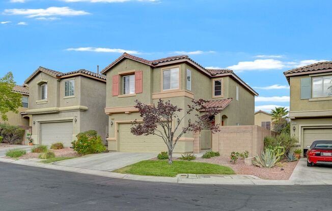Charming gated community home nestled in cul-de sac in Centennial Hills!