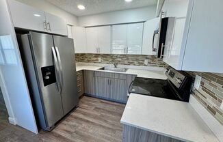 ROISMAN, AVRAHAM M TRSTEE ETAL - 100 SW 9 St