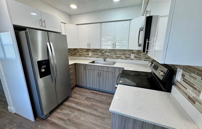 ROISMAN, AVRAHAM M TRSTEE ETAL - 100 SW 9 St