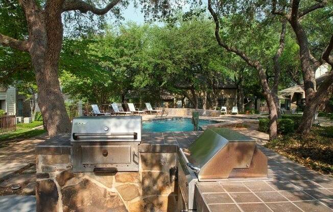 Swimming Pool w/ Outdoor Grilling Center at Carmel at Deerfield in San Antonio, TX